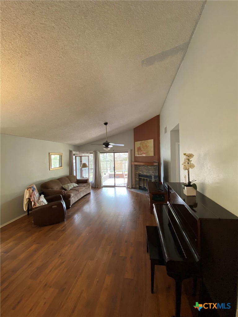 8305 Fort Sumter Road Austin, TX 78745 - Photo 14 of 23 a living room with furniture and a flat screen tv