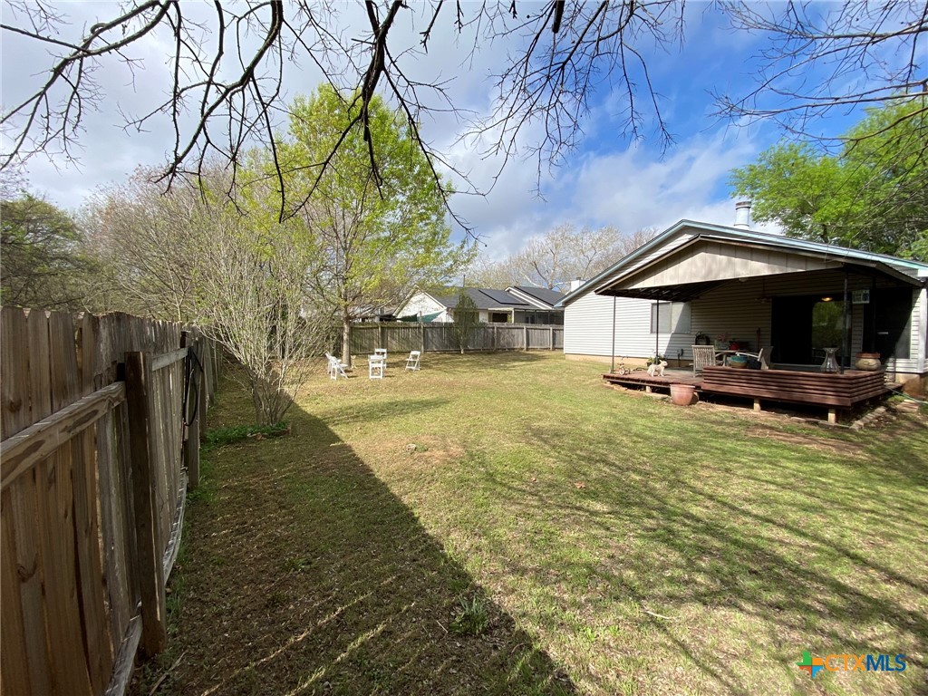 8305 Fort Sumter Road Austin, TX 78745 - Photo 7 of 23 a view of a swimming pool with a patio