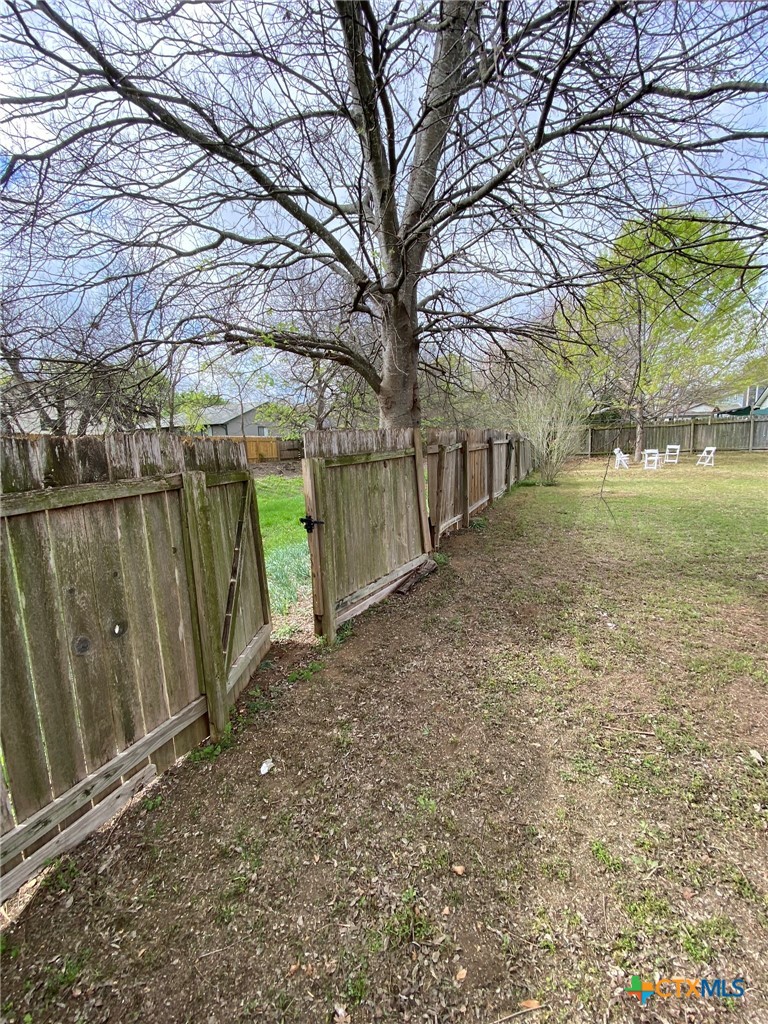 8305 Fort Sumter Road Austin, TX 78745 - Photo 9 of 23 a view of a backyard of the house