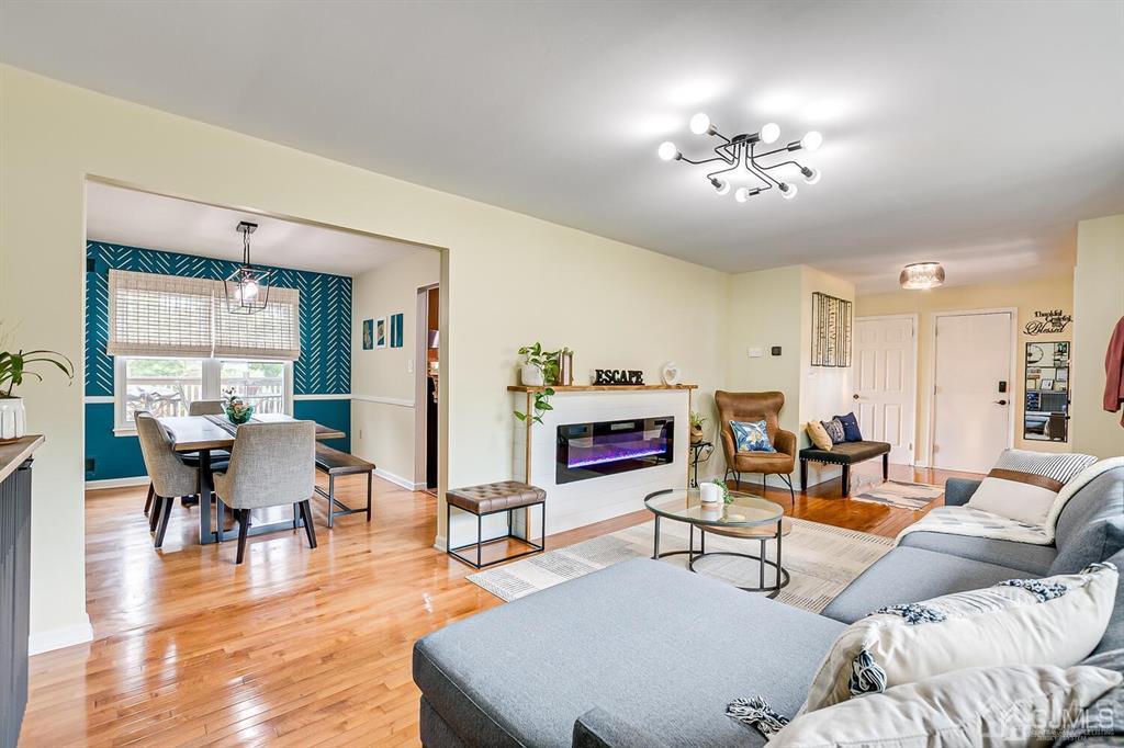 127 Hickory Road Somerset, NJ 08873 - Photo 13 of 51 a living room with furniture and wooden floor