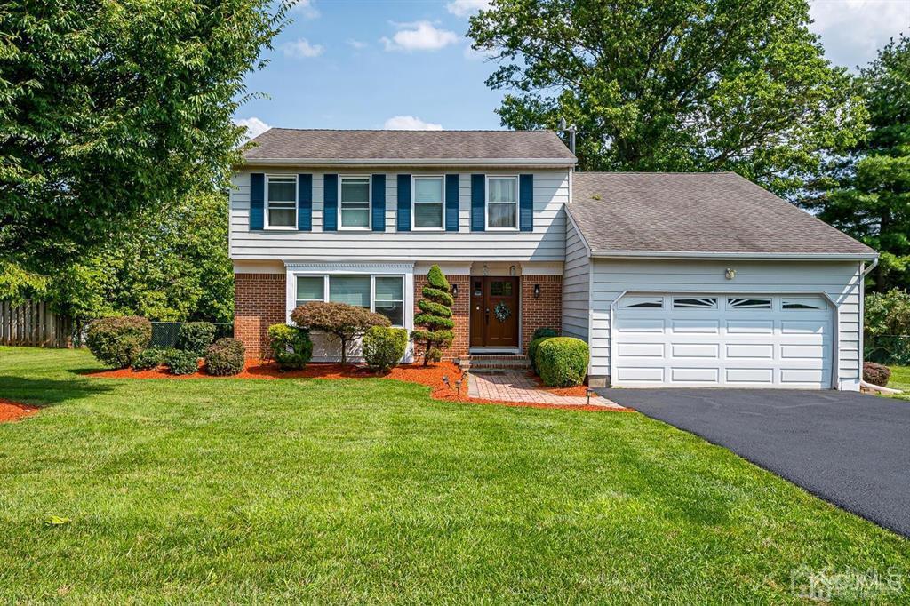 127 Hickory Road Somerset, NJ 08873 - Photo 2 of 51 a view of a house with a yard and sitting area