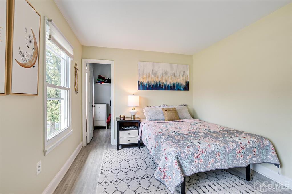 127 Hickory Road Somerset, NJ 08873 - Photo 31 of 51 a bedroom with a bed and a window