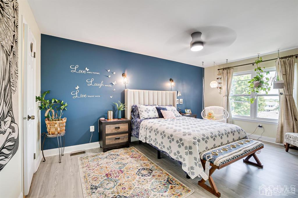 127 Hickory Road Somerset, NJ 08873 - Photo 33 of 51 a bedroom with a bed and window