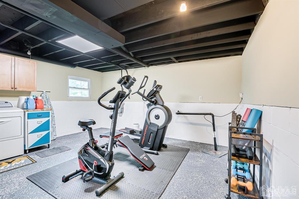 127 Hickory Road Somerset, NJ 08873 - Photo 38 of 51 a view of a room with gym equipment