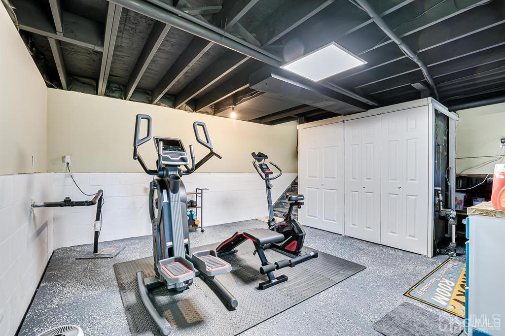 127 Hickory Road Somerset, NJ 08873 - Photo 40 of 51 a view of a room with gym equipment
