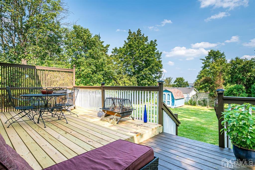 127 Hickory Road Somerset, NJ 08873 - Photo 45 of 51 a view of balcony with wooden floor and outdoor seating