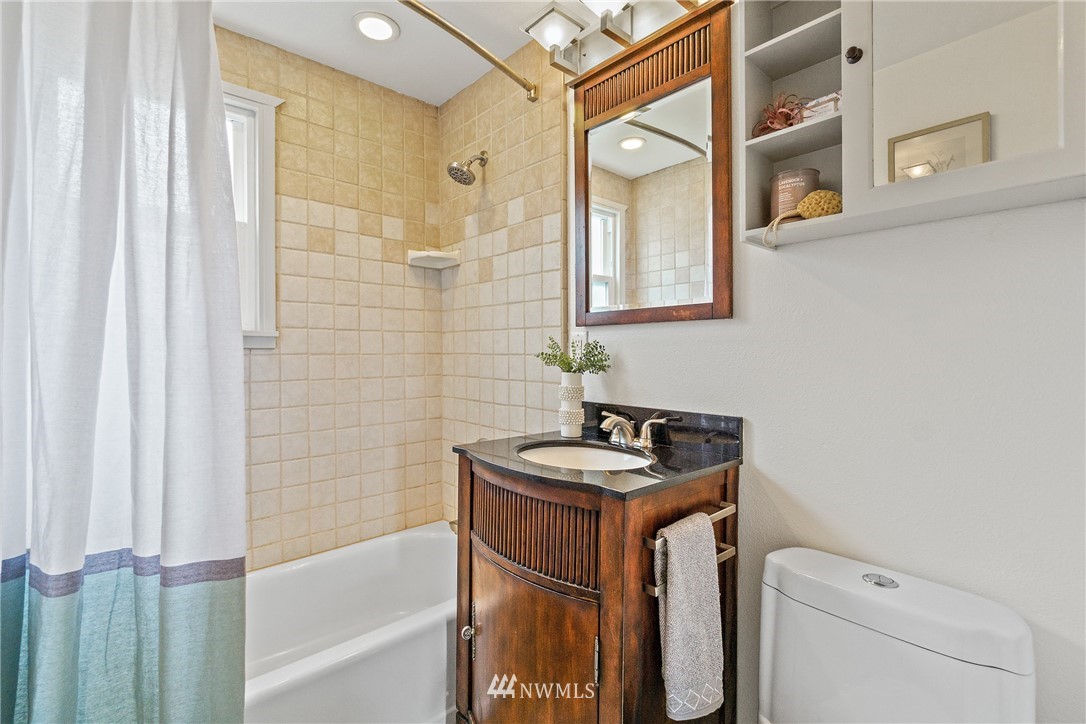 466 Grandey Way Northeast Renton, WA 98056 - Photo 12 of 21 a bathroom with a sink toilet and shower