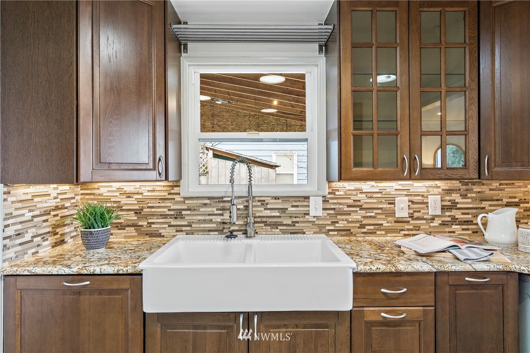 466 Grandey Way Northeast Renton, WA 98056 - Photo 6 of 21 a bathroom with a sink and a mirror