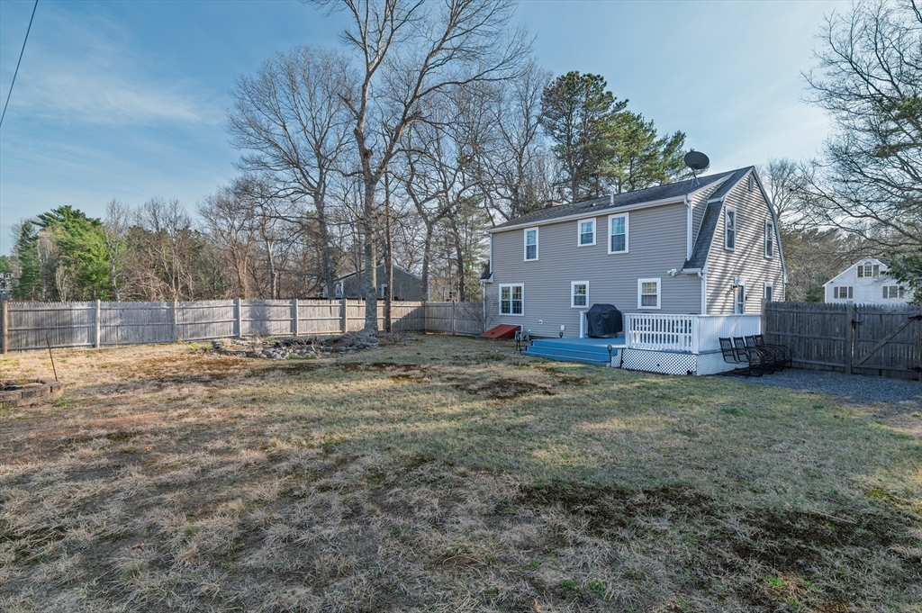 30 Huntington Road Plymouth, MA 02360 - Photo 32 of 35 a view of a house with a backyard