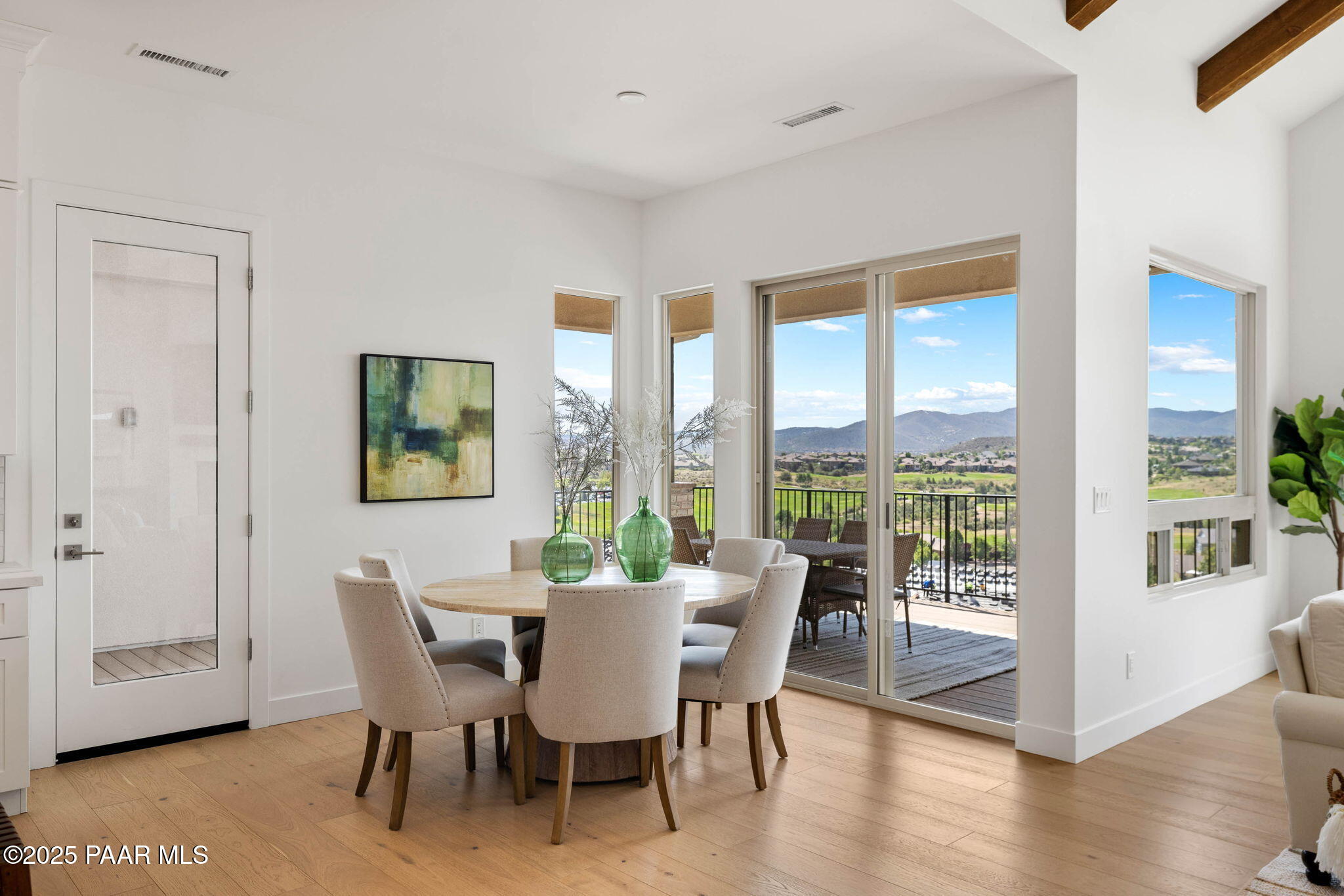 1109 South Lakeview Drive Prescott, AZ 86301 - Photo 17 of 48 a view of a dining room with furniture and wooden floor