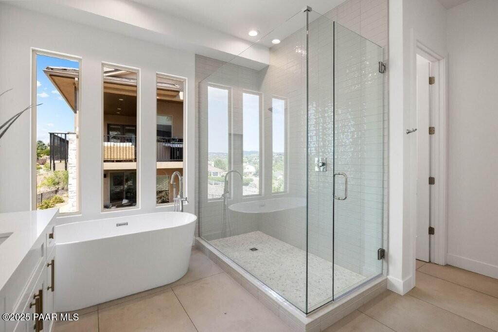 1109 South Lakeview Drive Prescott, AZ 86301 - Photo 29 of 48 a bathroom with a bathtub and a shower