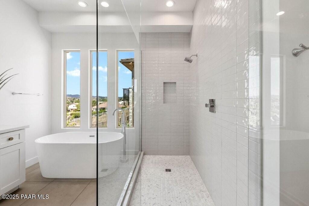 1109 South Lakeview Drive Prescott, AZ 86301 - Photo 30 of 48 a bathroom with a glass shower door