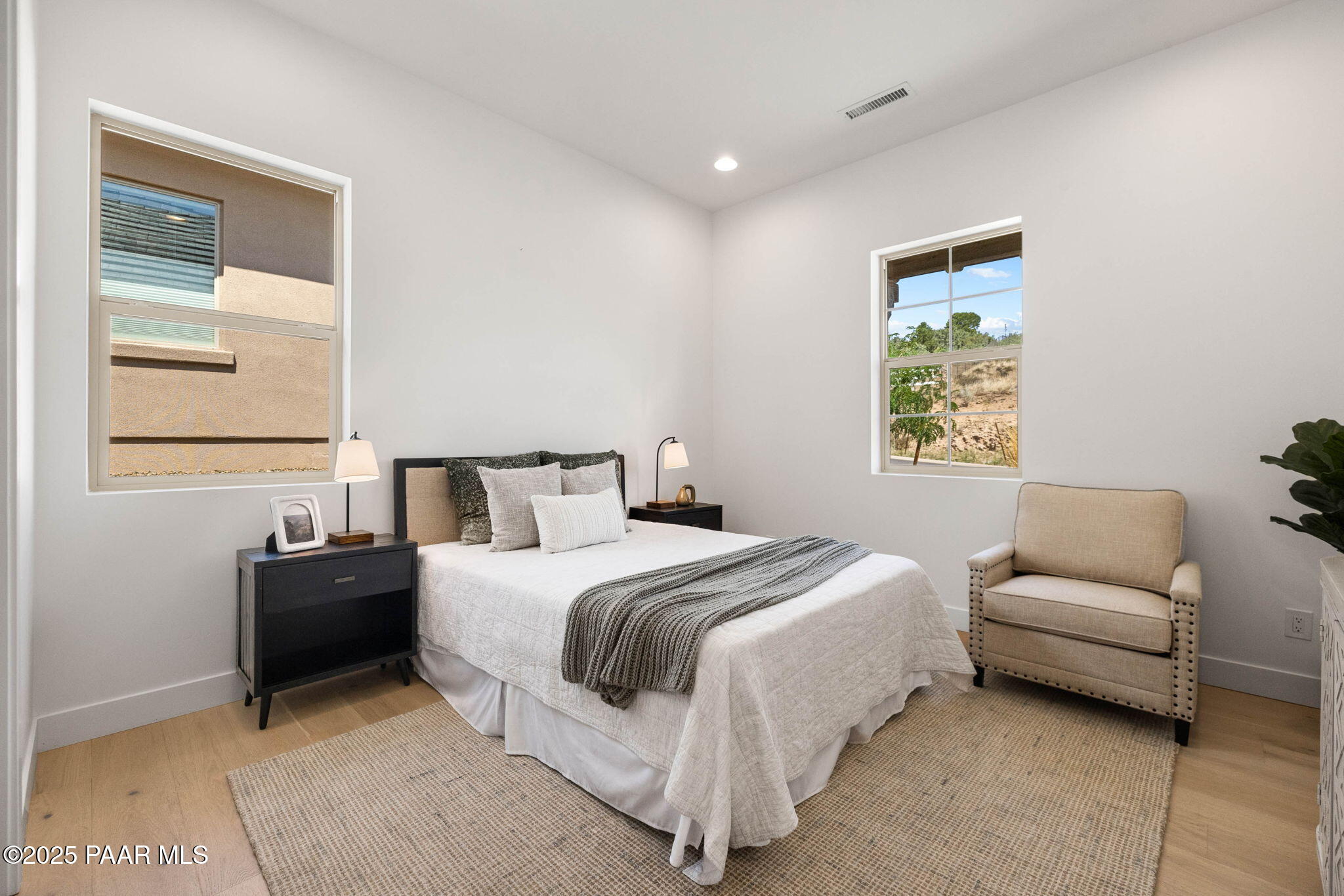 1109 South Lakeview Drive Prescott, AZ 86301 - Photo 36 of 48 a bedroom with a bed and a couch