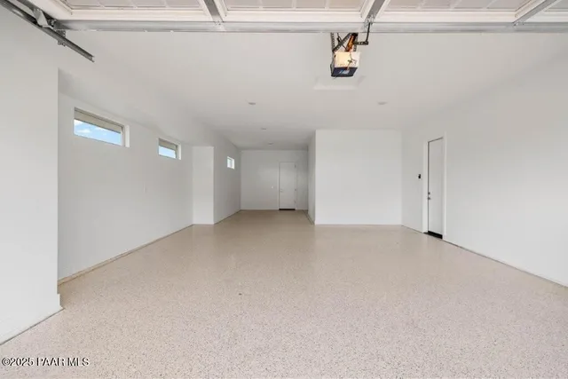 a view of a hallway with staircase