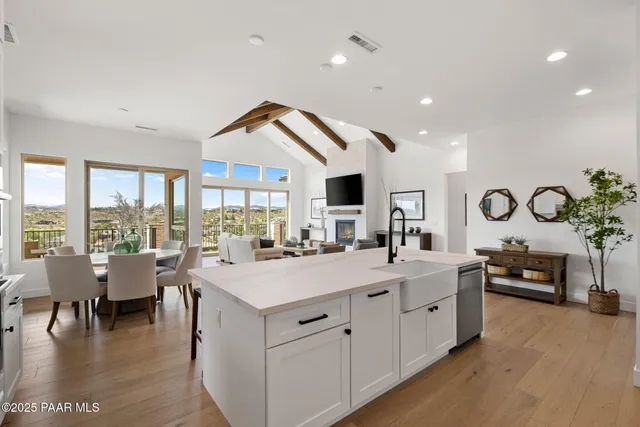 a view of living room with furniture and flat screen tv