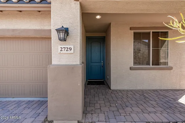 a view of a hallway with a door