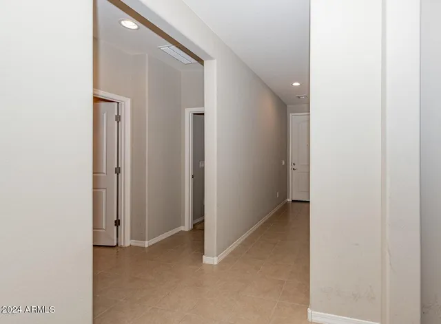 a view of hallway with closet