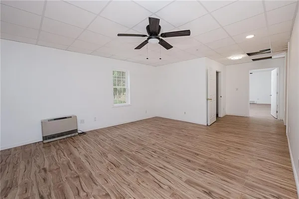 a view of bedroom with hardwood floor
