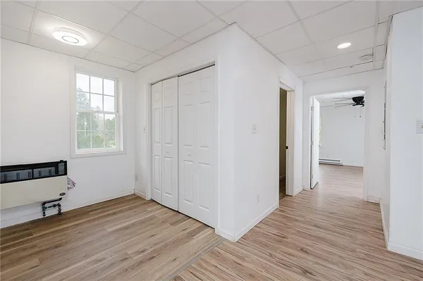 a kitchen with stainless steel appliances granite countertop a stove a refrigerator and a microwave