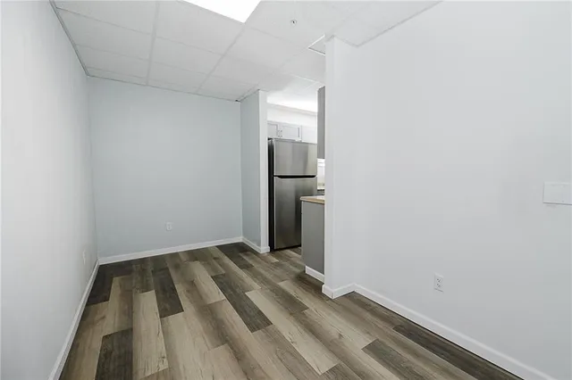 a kitchen with granite countertop a stove and a sink