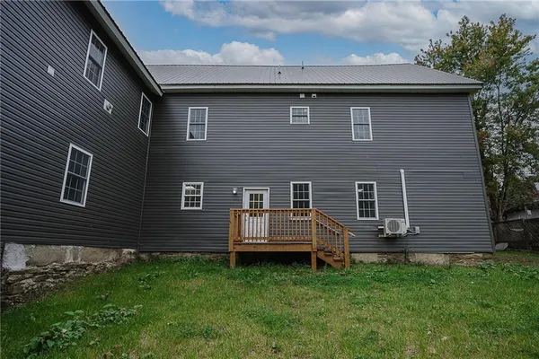 a view of a park with large trees