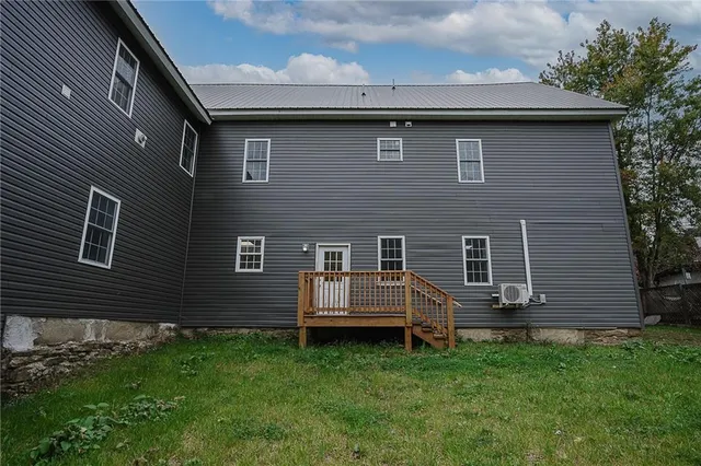 a view of a park with large trees