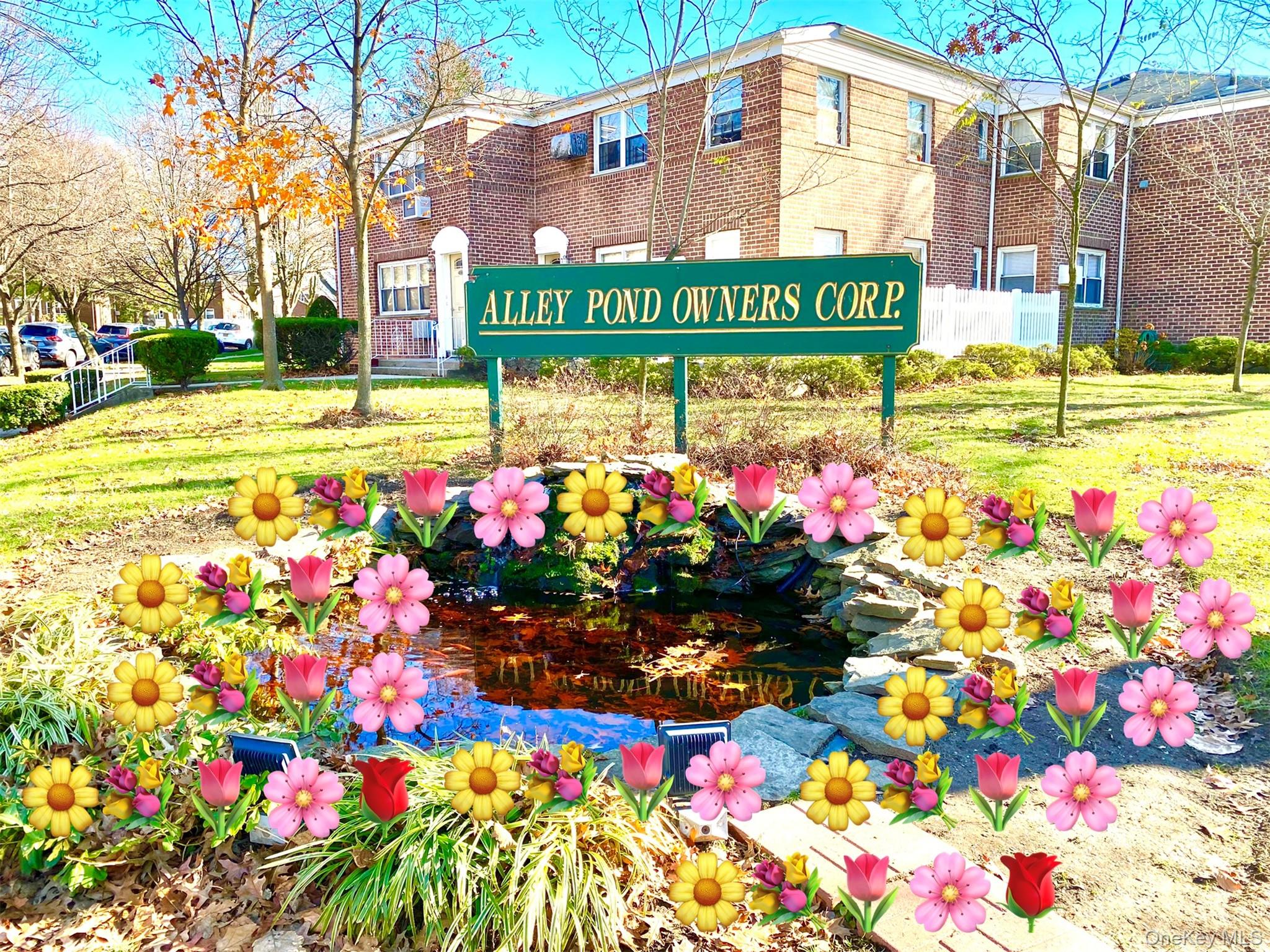 77-17 Springfield Boulevard, Unit 98 Queens, NY 11364 - Photo 18 of 18 a sign that is in front of flowers