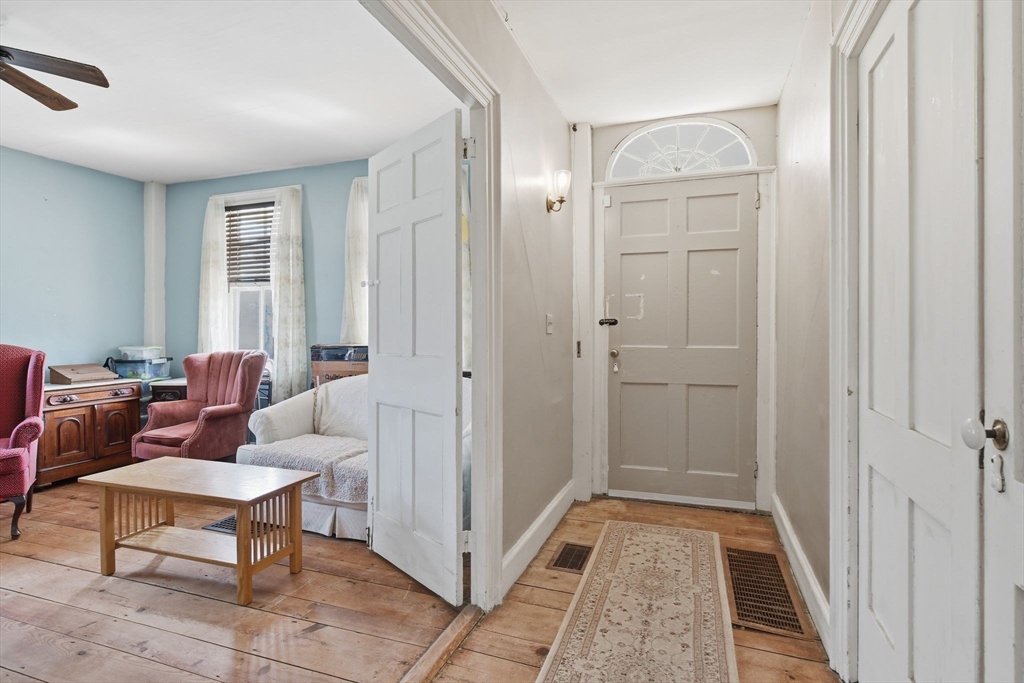 20 Depot Street Southwick, MA 01077 - Photo 11 of 36 a living room with furniture and a rug