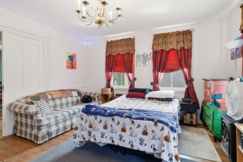 20 Depot Street Southwick, MA 01077 - Photo 16 of 36 a bedroom with bed and wooden floor