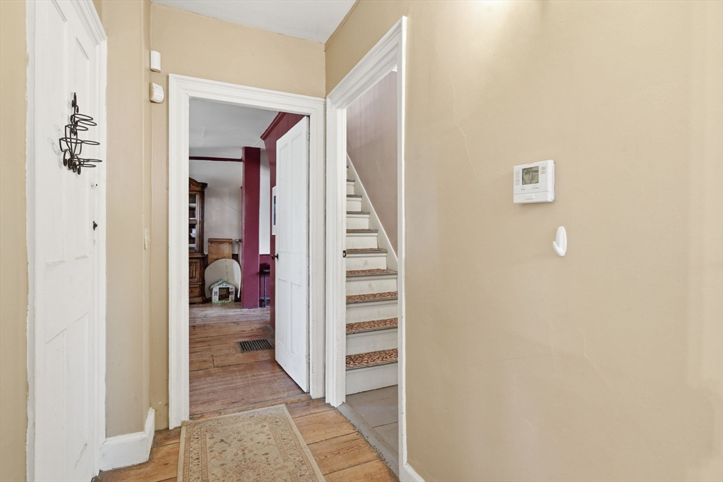 20 Depot Street Southwick, MA 01077 - Photo 19 of 36 a view of a hallway with closet and a living room