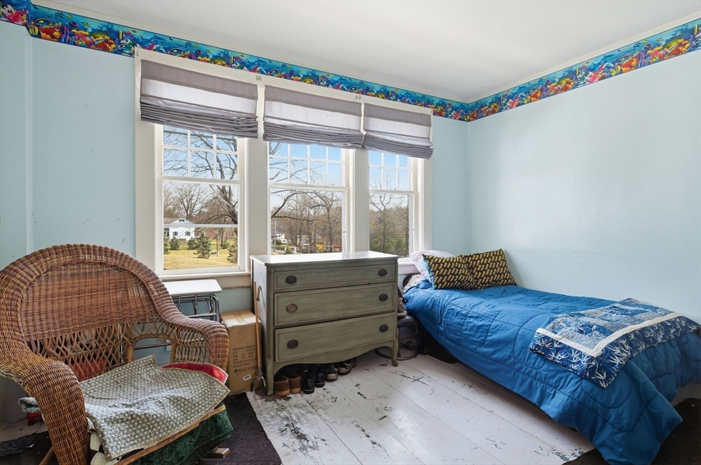 20 Depot Street Southwick, MA 01077 - Photo 22 of 36 a bedroom with a bed and a window
