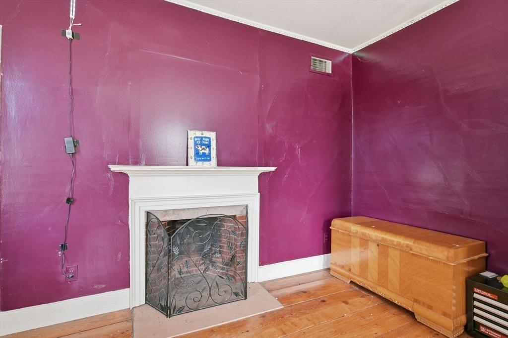 20 Depot Street Southwick, MA 01077 - Photo 24 of 36 a living room with furniture and a fireplace