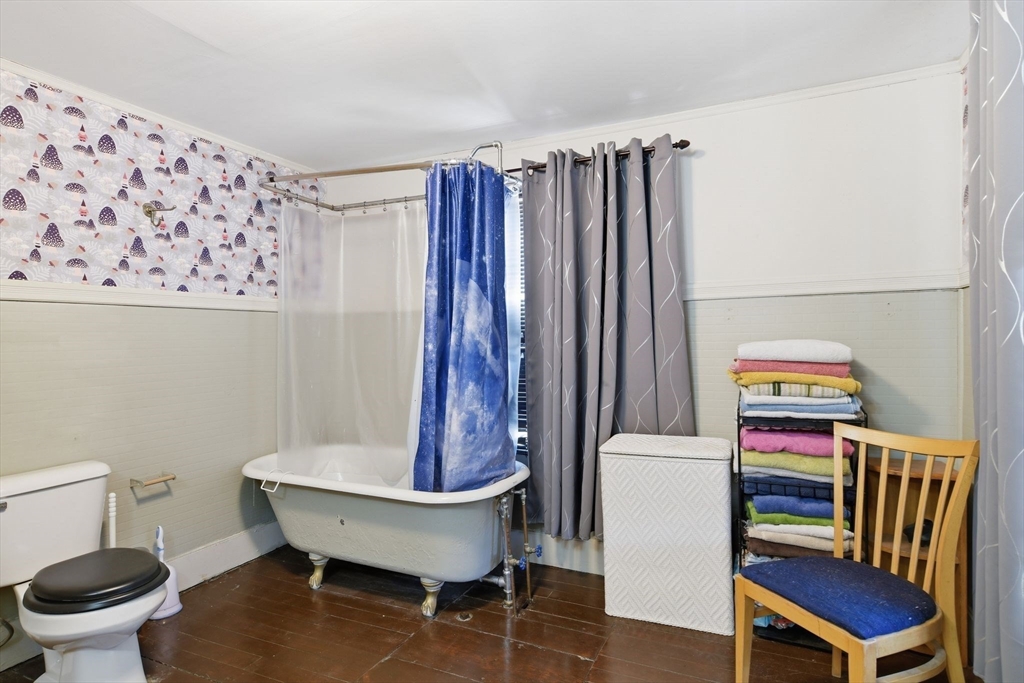 20 Depot Street Southwick, MA 01077 - Photo 30 of 36 a very nice looking room with a big chair and a toilet