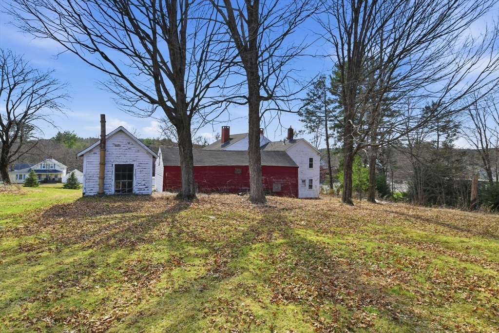 20 Depot Street Southwick, MA 01077 - Photo 35 of 36 a large tree in front of a house