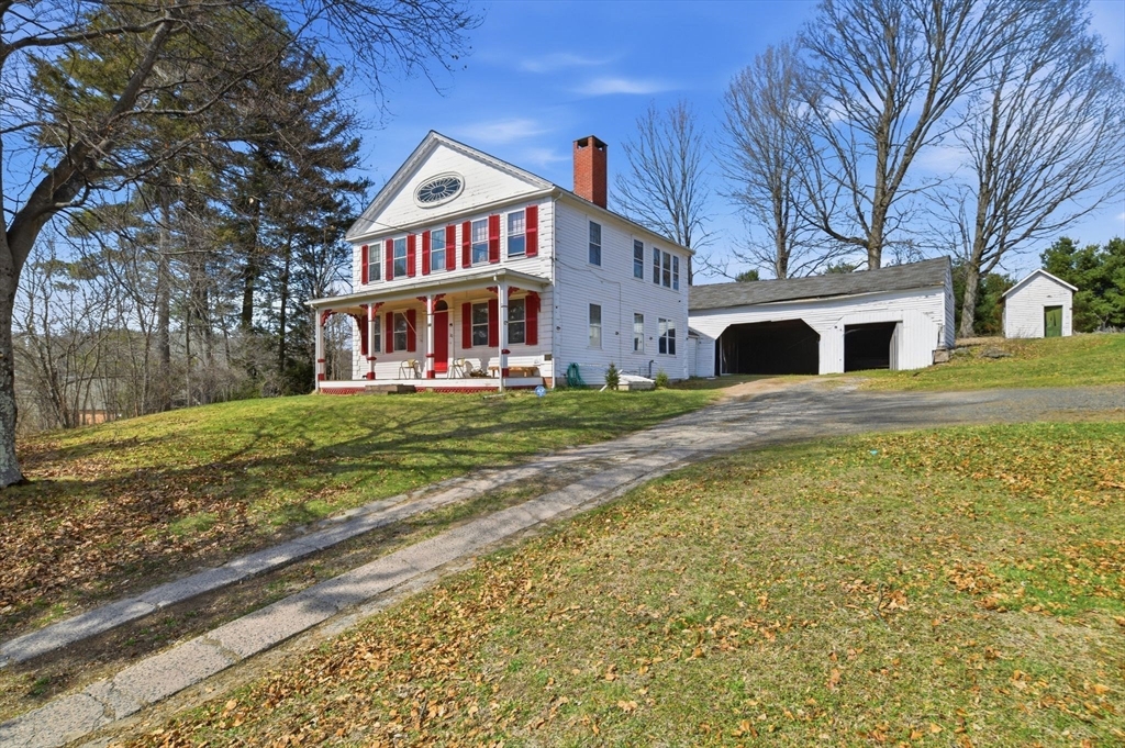 20 Depot Street Southwick, MA 01077 - Photo 36 of 36 a view of a house with a yard and sitting area