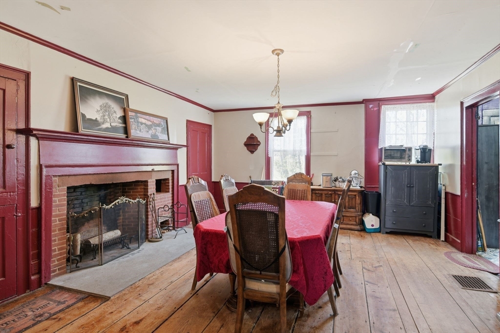 20 Depot Street Southwick, MA 01077 - Photo 4 of 36 a view of a livingroom with furniture and a fireplace