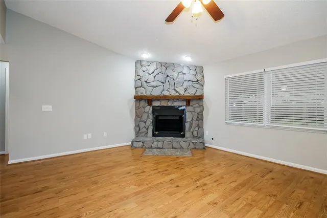 a view of fireplace and window in a room