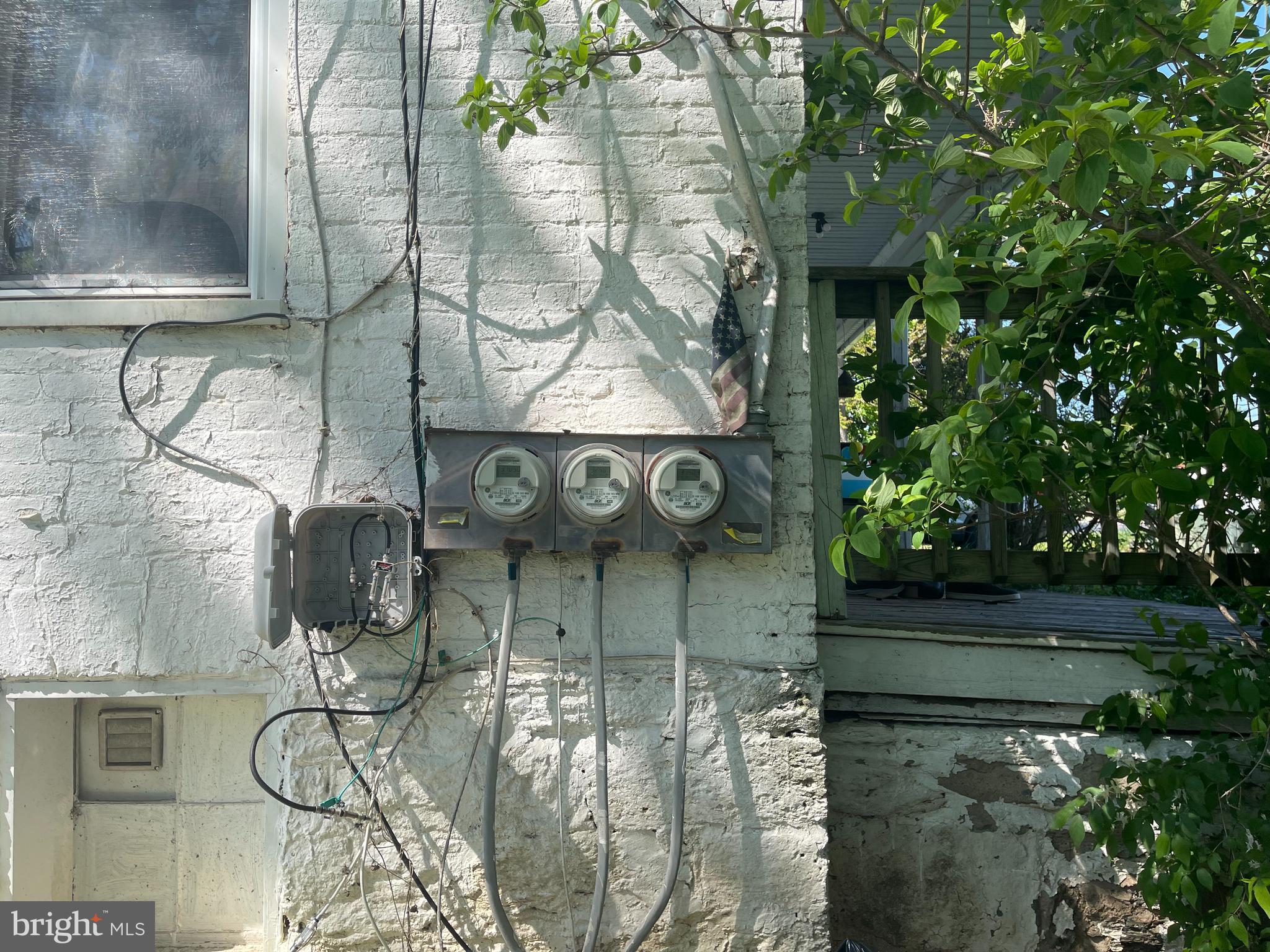 720 Littlestown Pike Westminster, MD 21157 - Photo 7 of 7 a room with water heater and wooden fence