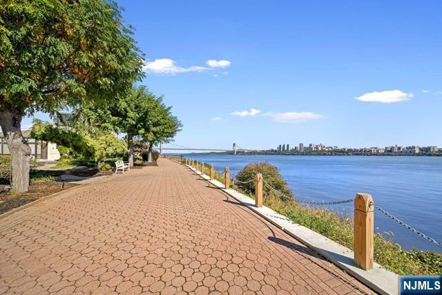 1225 River Road, Unit 6A Edgewater, NJ 07020 - Photo 2 of 30 a view of wooden floor and a lake view