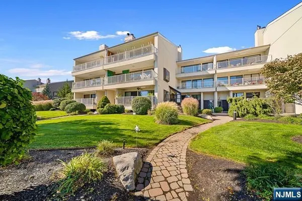 a view of a building with garden