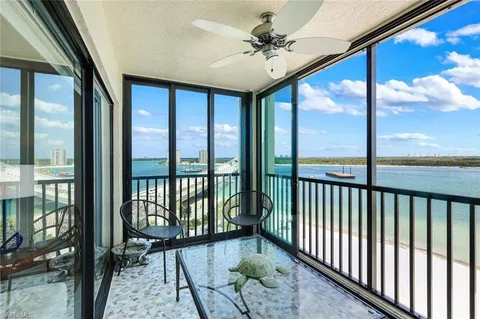 a view of a porch with wooden floor