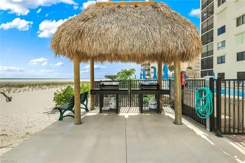 a view of a chairs and tables in patio