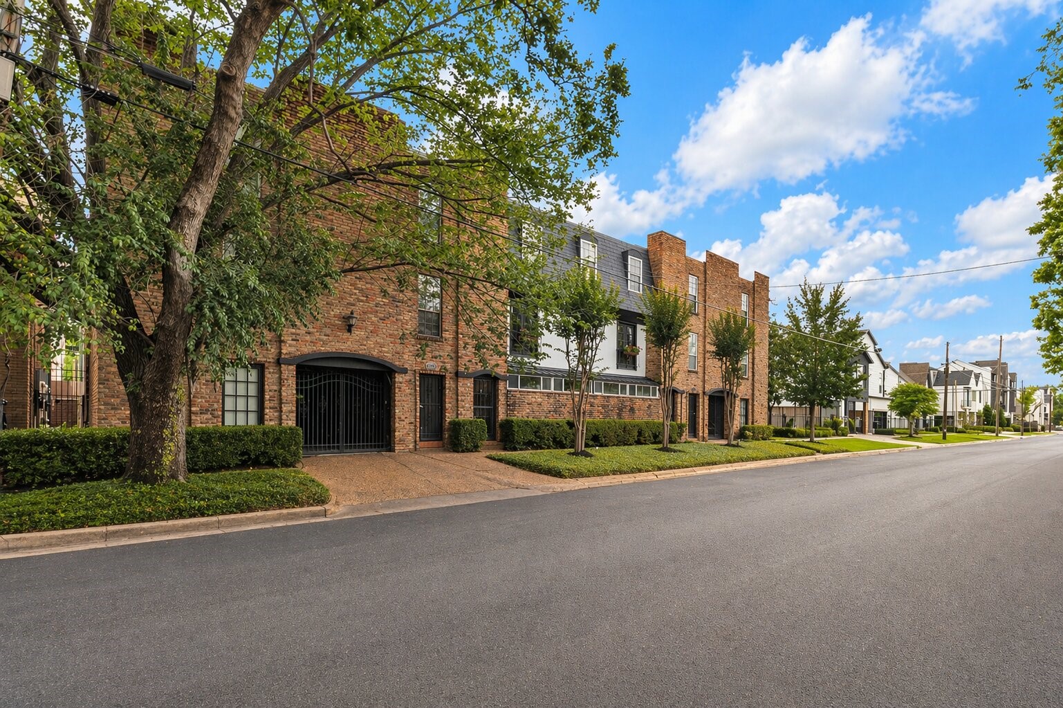 1909 Brun Street, Unit 17 Houston, TX 77019 - Photo 1 of 15 a view of road with trees and a big yard