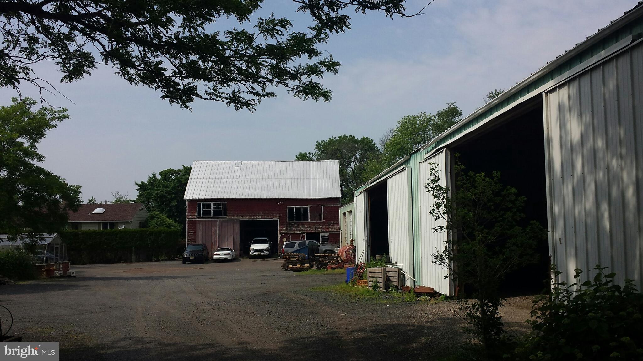 545 Weston Canal Road Somerset, NJ 08873 - Photo 12 of 41 a view of a house with backyard and garden