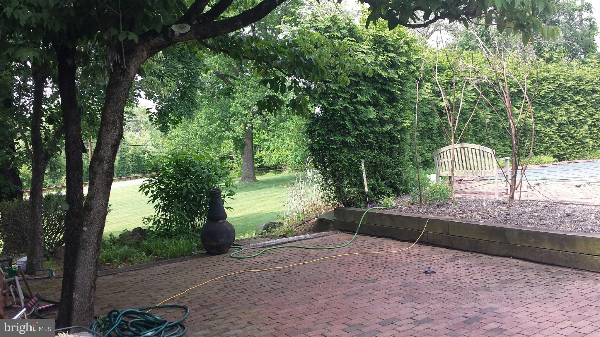 545 Weston Canal Road Somerset, NJ 08873 - Photo 16 of 41 a view of a backyard with large trees