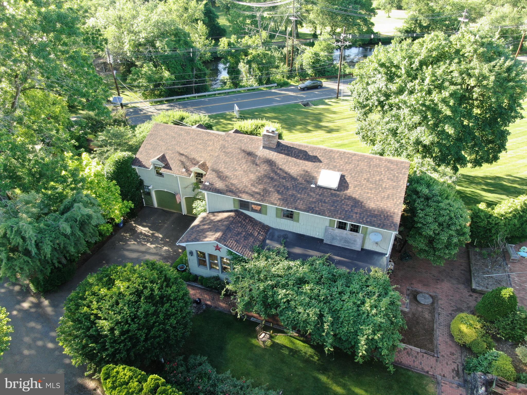 545 Weston Canal Road Somerset, NJ 08873 - Photo 21 of 41 an aerial view of a house with a yard basket ball court and outdoor seating