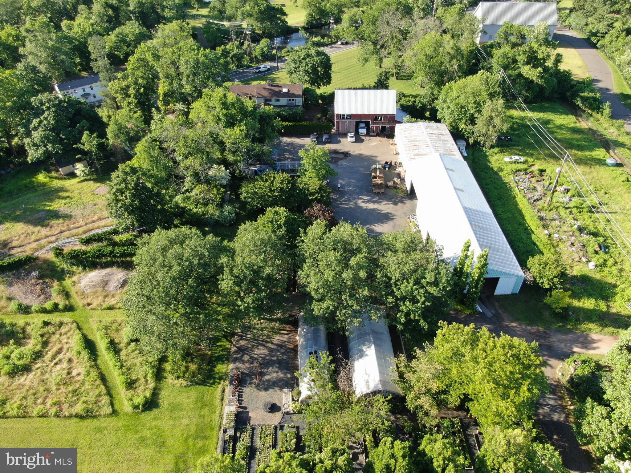 545 Weston Canal Road Somerset, NJ 08873 - Photo 23 of 41 an aerial view of residential house with outdoor space and trees all around