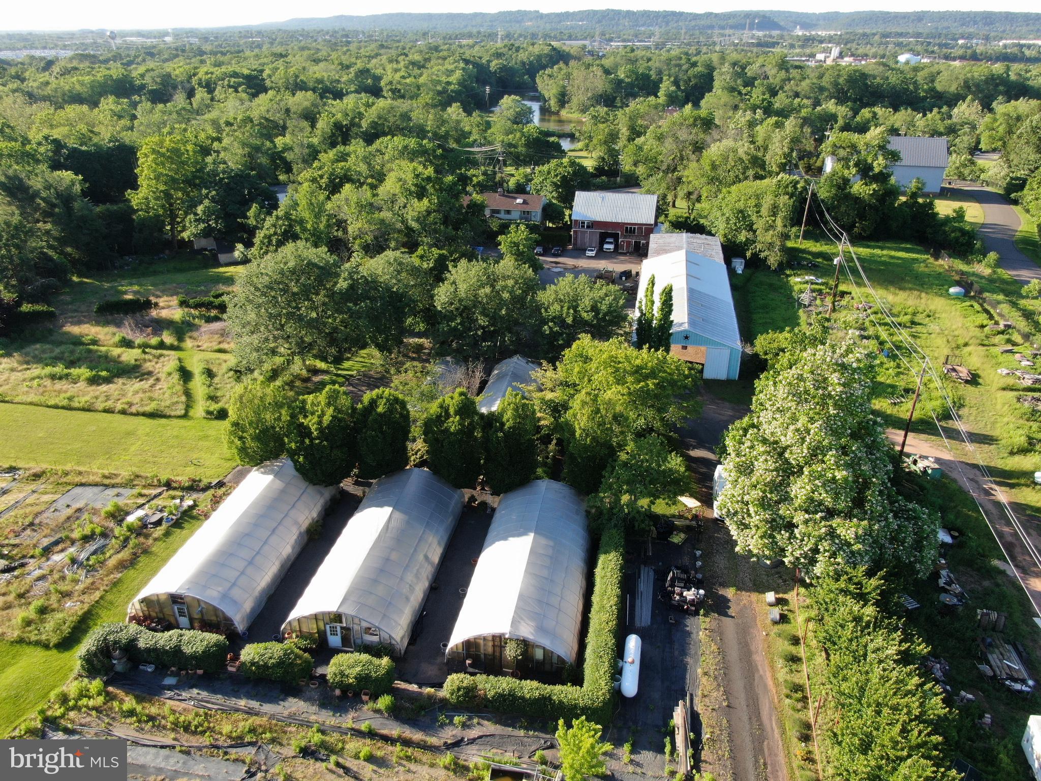 545 Weston Canal Road Somerset, NJ 08873 - Photo 36 of 41 an aerial view of a house with a yard and lake view