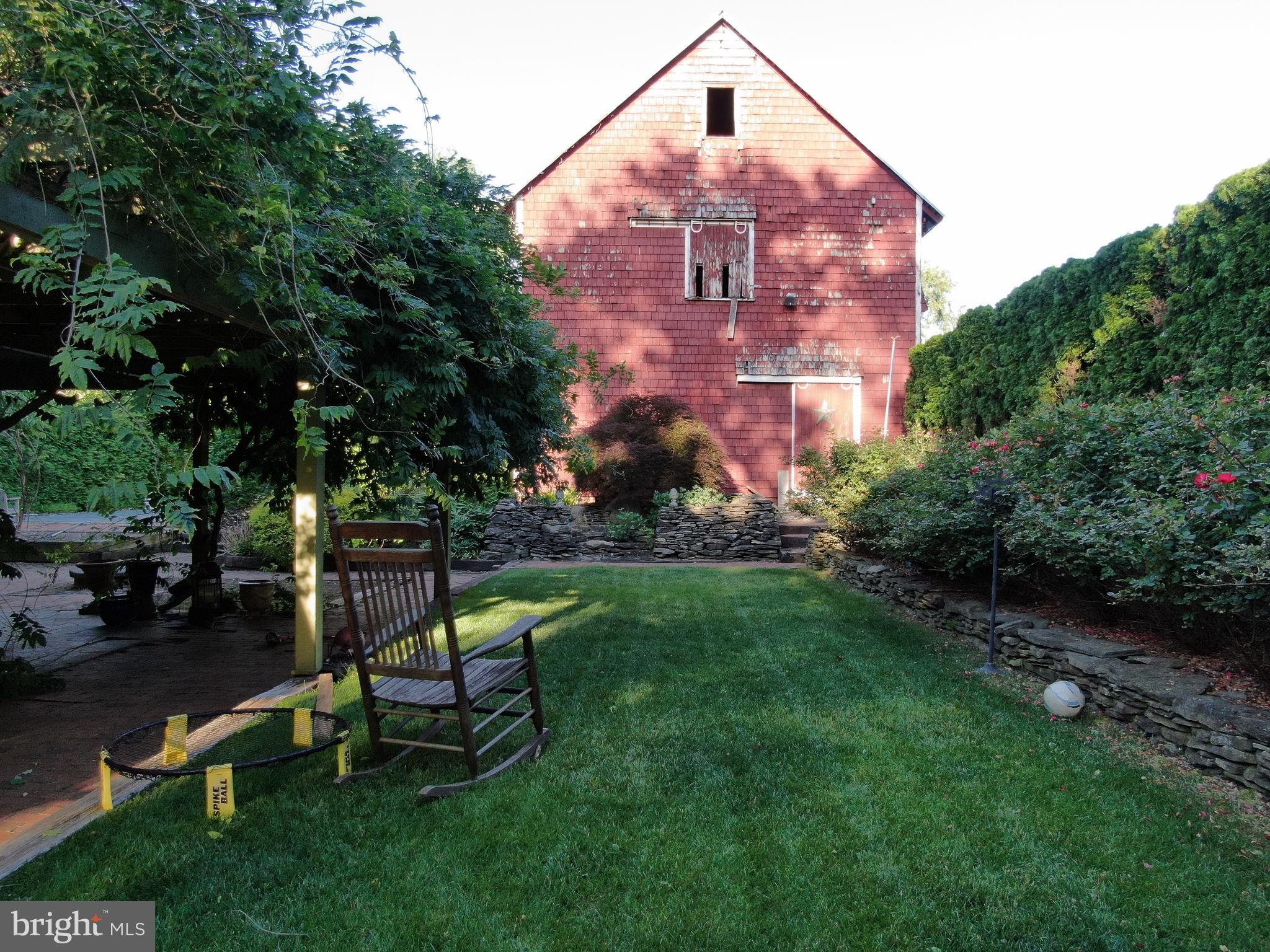 545 Weston Canal Road Somerset, NJ 08873 - Photo 39 of 41 a view of a bench in the garden
