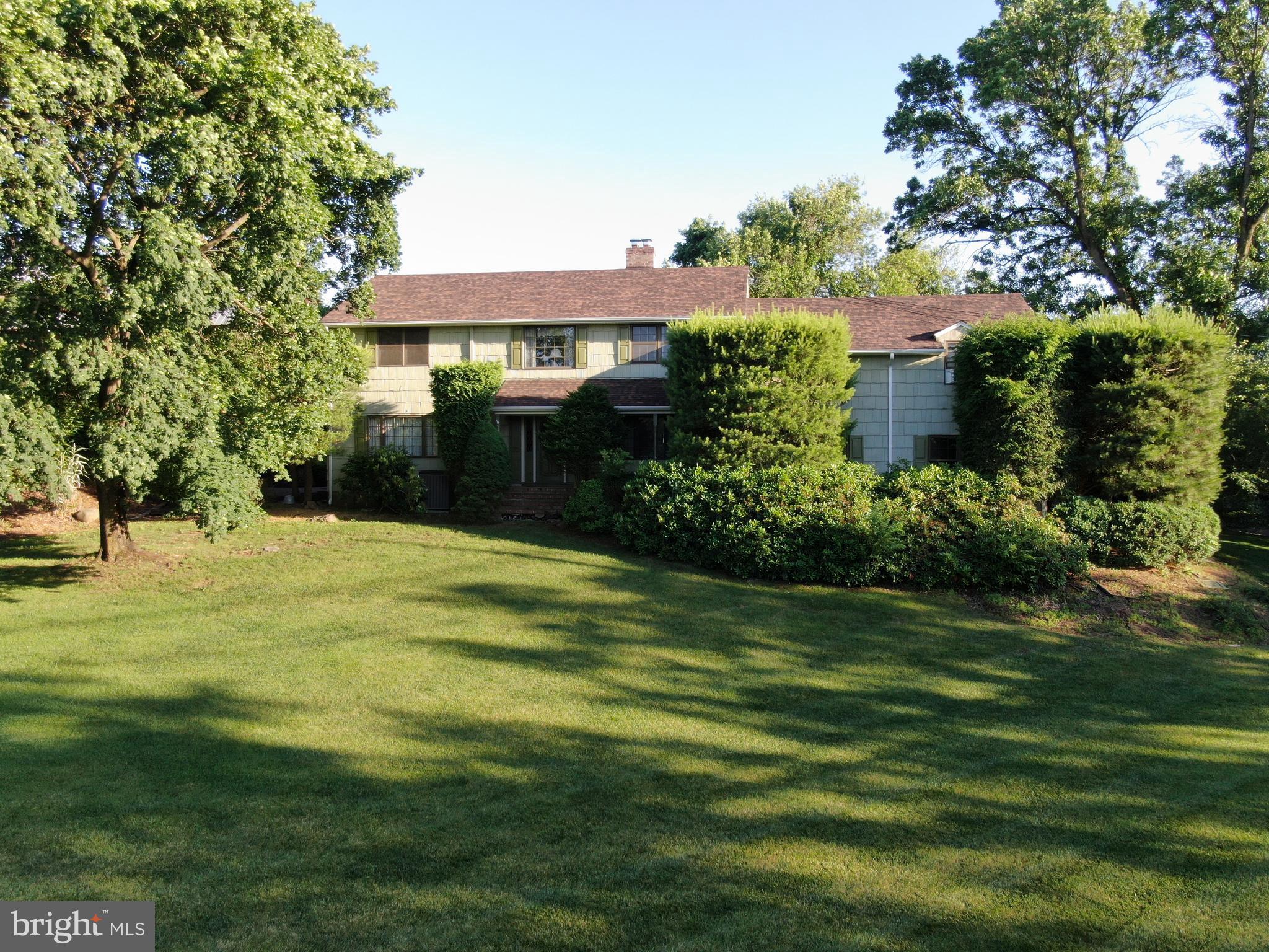 545 Weston Canal Road Somerset, NJ 08873 - Photo 41 of 41 a front view of a house with a garden